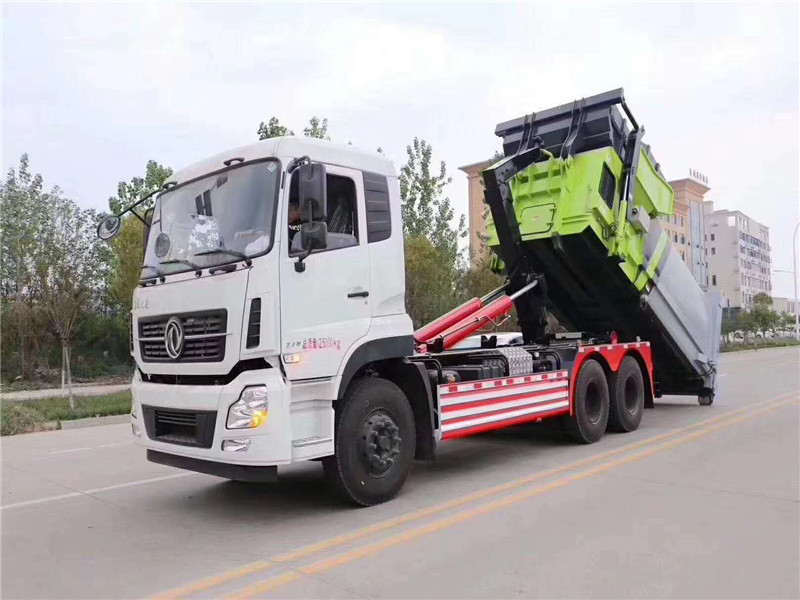 國(guó)六東風(fēng)天龍后雙橋20噸車(chē)廂可卸式(勾臂)垃圾車(chē) 國(guó)六東風(fēng)天龍后雙橋20噸車(chē)廂可卸式(勾臂)垃圾車(chē)